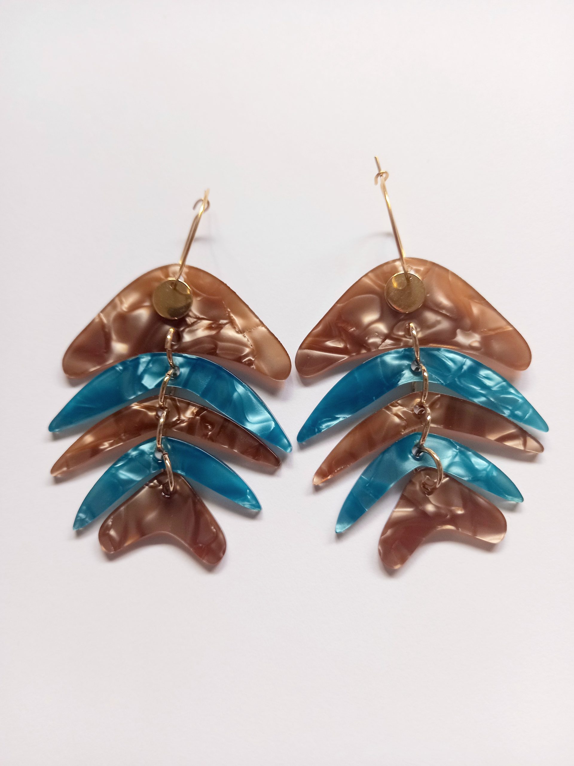 Pendientes raspas océano.