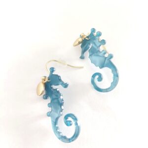 Pendientes caballito de mar turquesa.